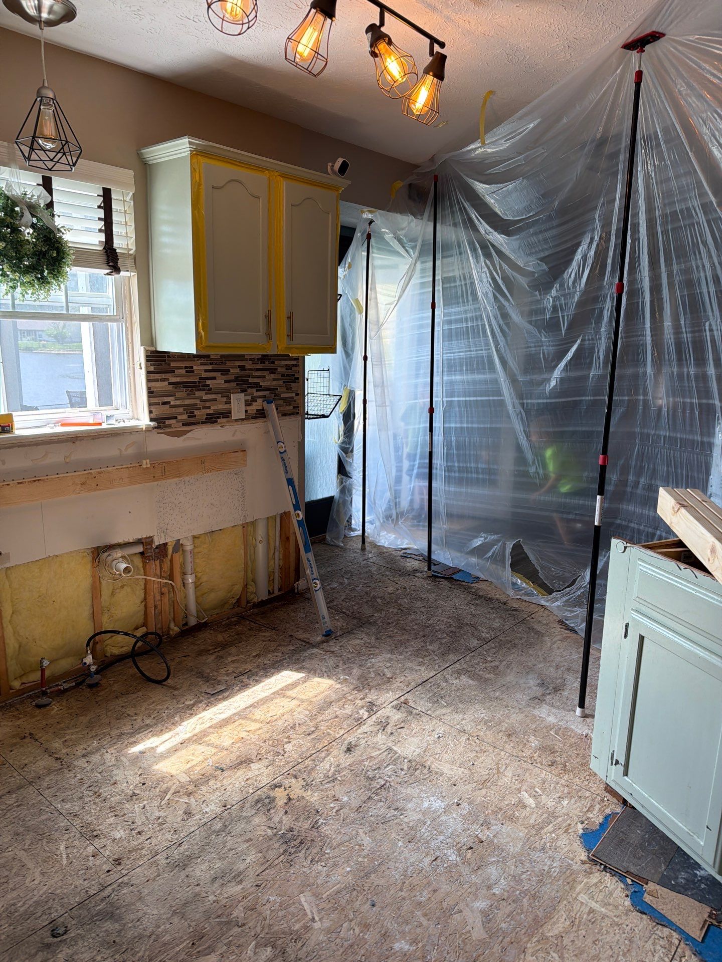 water damaged walls , ceiling and floor